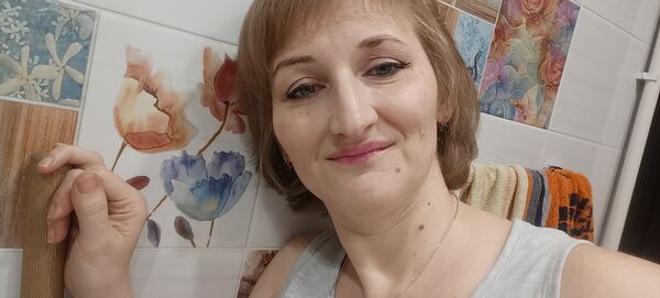  ,   Olesia, 43 ,   